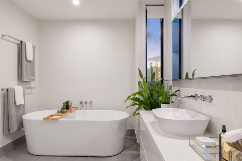 Tub-to-shower conversion with freestanding tub
