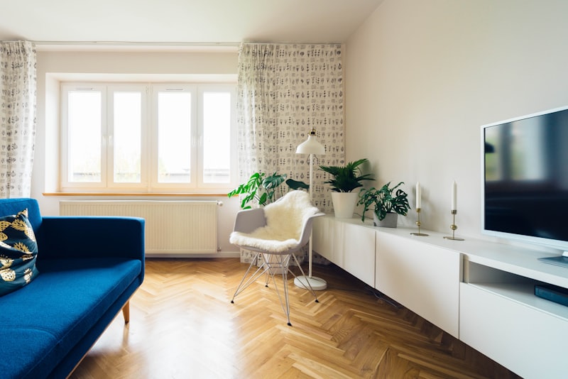 Living room with herringbone hardwood flooring
